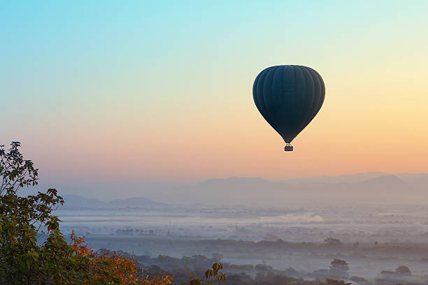 istock Hot air balloon over plain of Mandalay 626916700