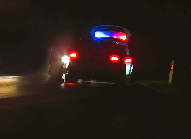 istock police car, cop pursuit in night blue red light 626917296