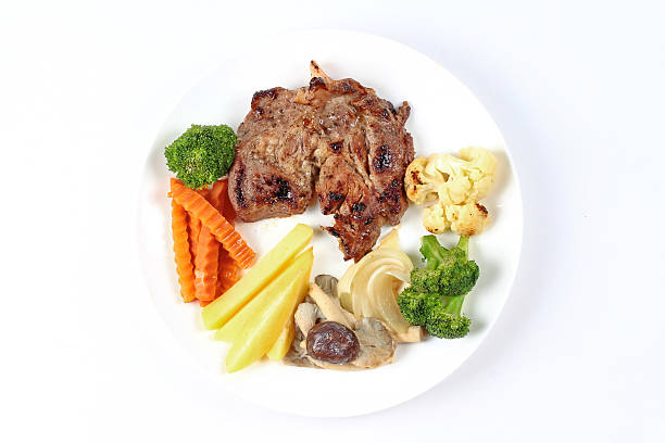 istock Home made ,Pork steak and mixed vegetables served. 626917448