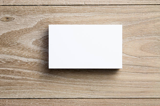 istock Business card on wood 626930252