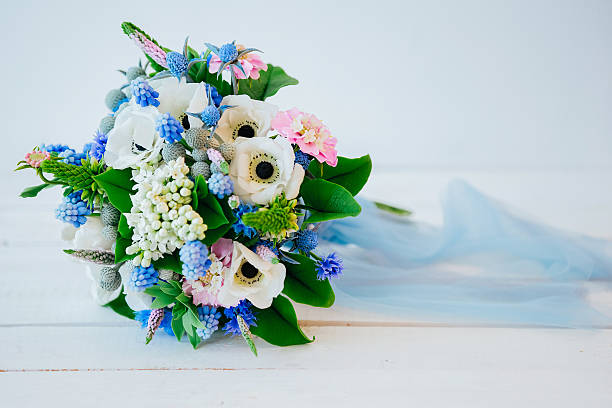 istock Beautiful wedding bouquet lying on a transparent chair. 626932164