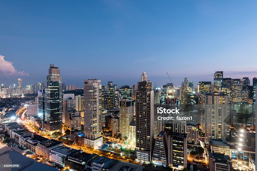 Makati Skyline, Metro Manila - Philippines Makati Skyline at night. Makati is a city in the Philippines` Metro Manila region and the country`s financial hub. It`s known for the skyscrapers and shopping malls. Manila - Philippines Stock Photo