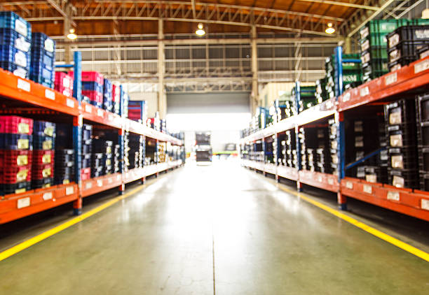 istock Blurred image of goods shelf in warehouse 626944096