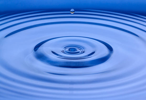 istock Water drops closeup on a blue background. 626944156