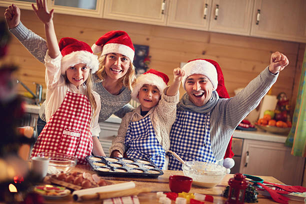 istock happy family baking cookies on xmas 626953562