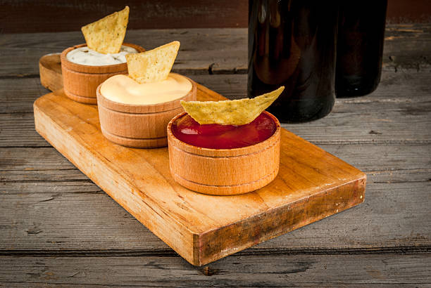 istock Nachos with sauces and beer 626960056