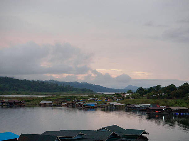 Fog,morning light a view from from the bridge. Fog,morning light a view from from the bridge. the Sagklaburi,Kanchanaburi. sangkhla stock pictures, royalty-free photos & images