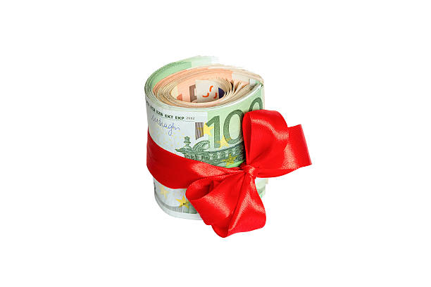 istock euro with red bow Isolated on white background 626960554