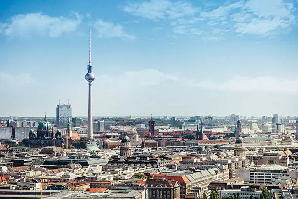 east berlin cityscape with television tower and cathedral under blue sky