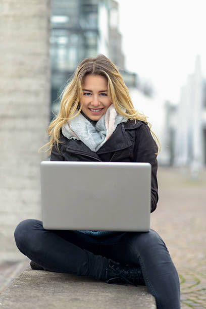 istock Young woman working on her laptop 626962824