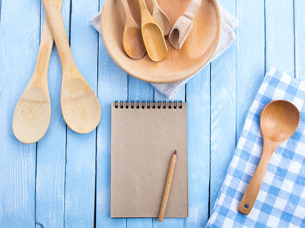 istock plate wooden spoons kitchen table rustic wooden background 626963614