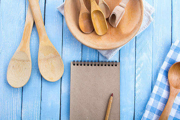 istock plate wooden spoons kitchen table rustic wooden background 626963688