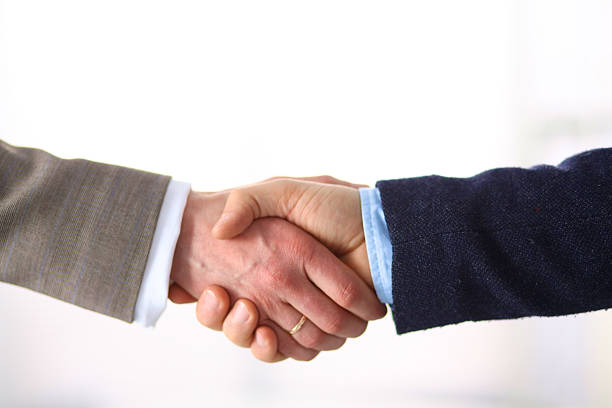 istock Business handshake. Two businessman shaking hands with each other in 626963808