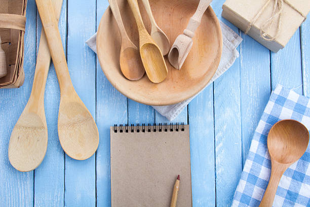 istock plate wooden spoons kitchen table rustic wooden background 626963846