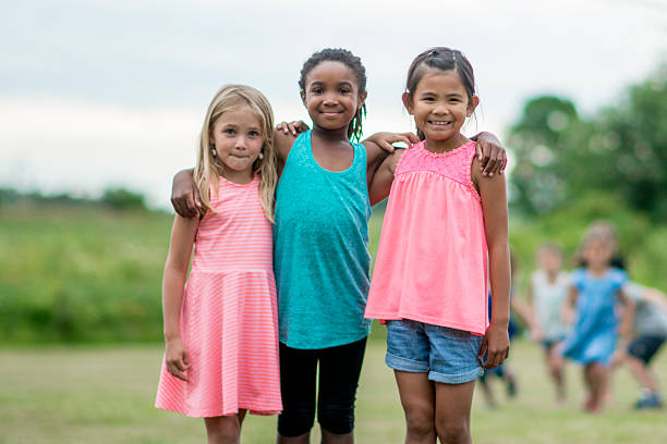 istock Girl Friends Standing Together 626964598