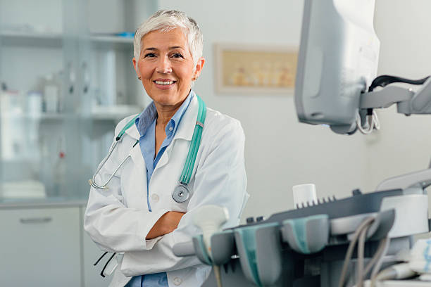 Female Doctor In Her Office. stock photo