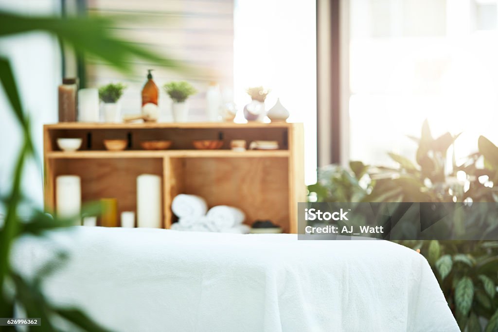 Decor that promotes relaxation Shot of an empty room at a day spa Massaging Stock Photo
