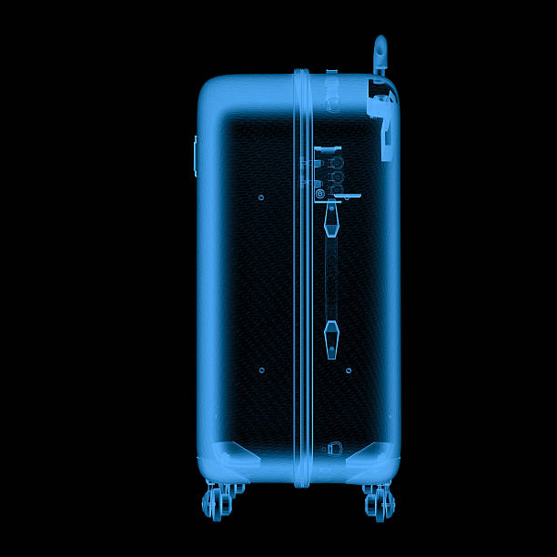 istock x ray luggage isolated on black 626998164