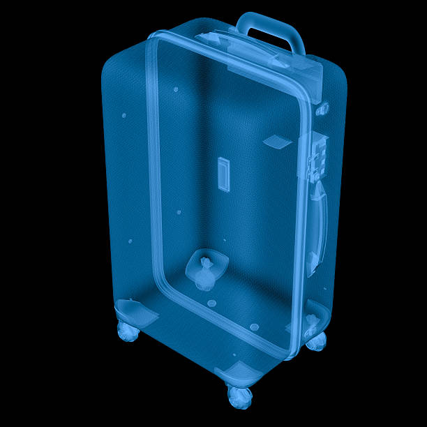 istock x ray luggage isolated on black 626998246