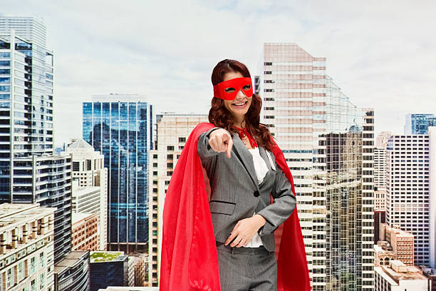 istock Smiling superhero outdoor and pointing 627000922