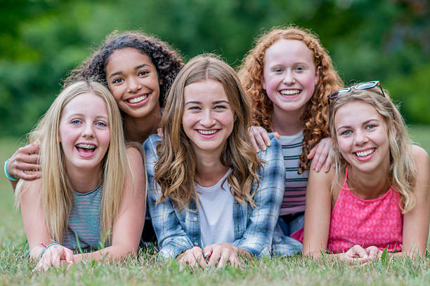 istock Girls Hanging out at the Park 627002092