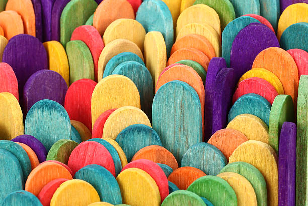 Colorful wooden sticks Here are colorful wooden ice cream popsicle sticks. popsicle stick stock pictures, royalty-free photos & images