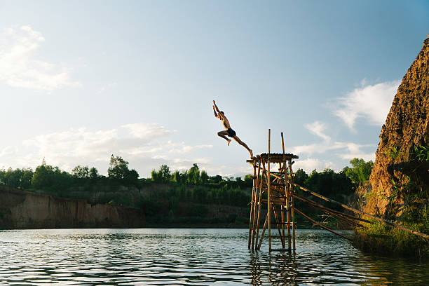 istock Man jumping in the water 627010006
