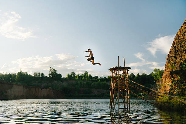 istock Man jumping in the water 627010012