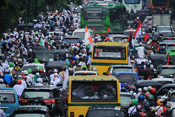 Jakarta, Indonesia - December 2, 2016: Jakarta, Indonesia 2016: Millions of Muslims from various regions gathered at the National Monument (Monas). They held a peaceful demonstration, dubbed the Peace Action 212. Their demands are promptly prosecute Jakarta governor non-active (Basuki Tjahaja Purnama) allegedly degrading religion.