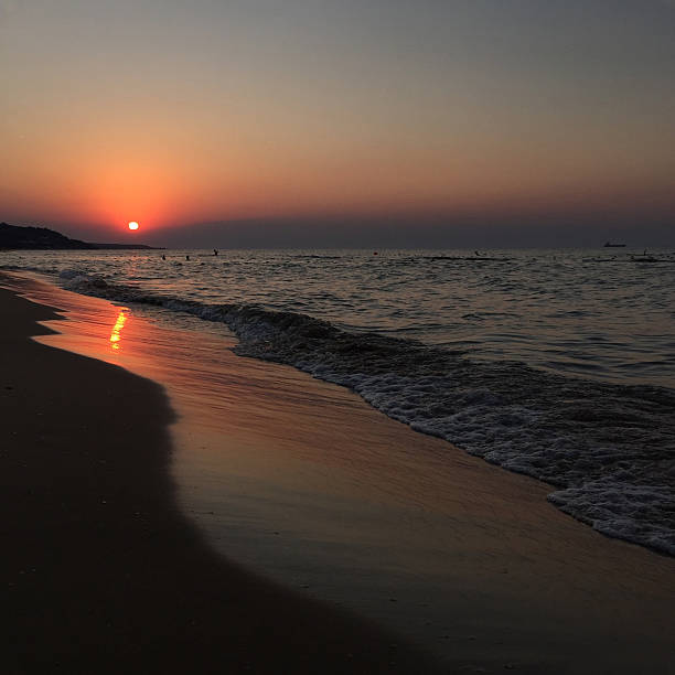 istock sunset by sea in summer 627014704