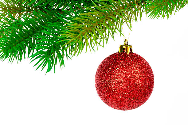 istock Red christmas ball hanging on green pine branch 627020526