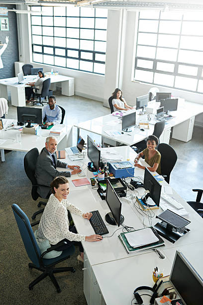 istock Looking down at the company professionals 627020550