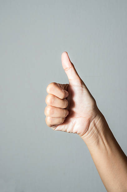 istock Woman hand with thumps up. 627021074