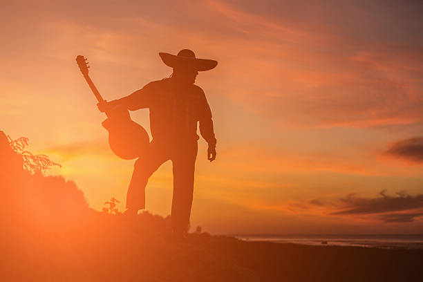 istock Musician on the coast. Mexican 627021436