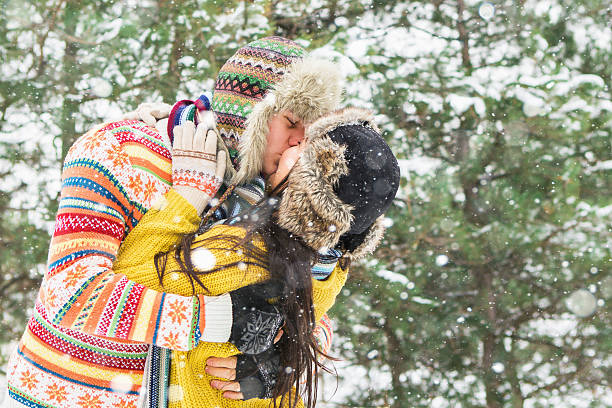 istock Loving couple in the winter park 627022662