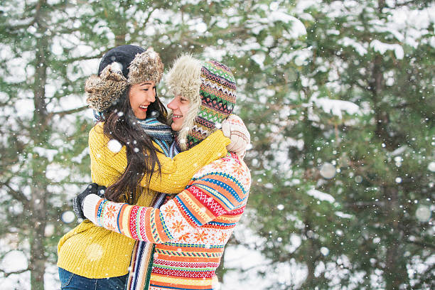 istock Loving couple in the winter park 627022968