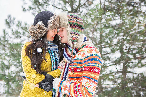 istock Loving couple in the winter park 627023030