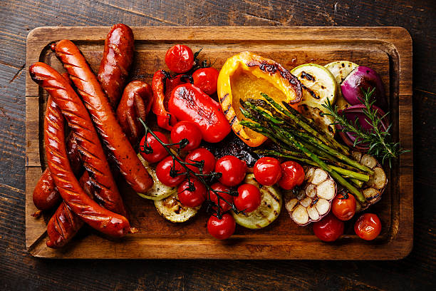 istock Grilled sausages and vegetables 627023432