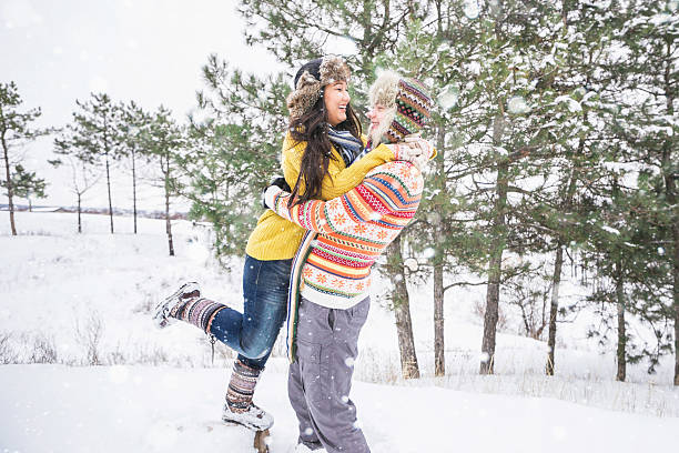 istock Loving couple in the winter park 627023544