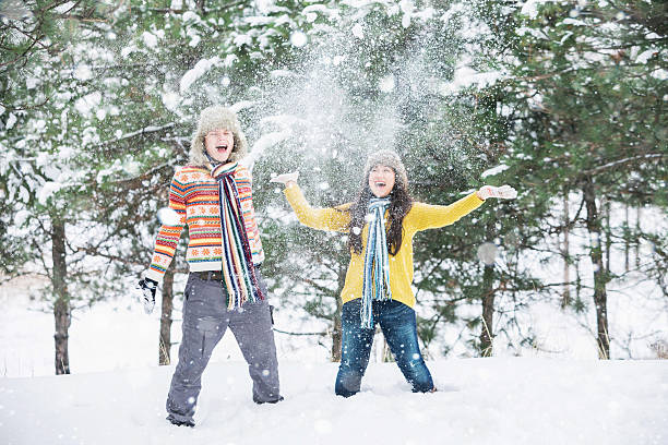 istock Loving couple in the winter park 627029980