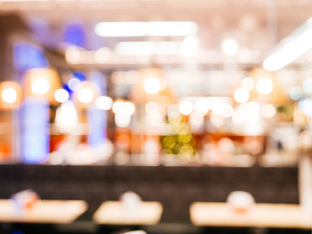 istock Out of focus image of modern cafe interior 627030416