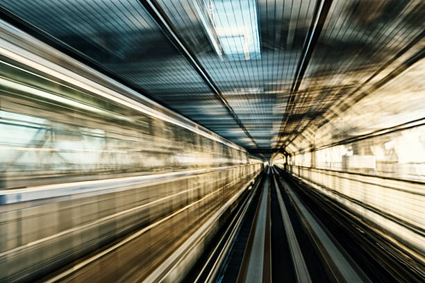 blurred motion on the subway in tokyo - shiodome urban scene blurred motion tokyo prefecture imagens e fotografias de stock