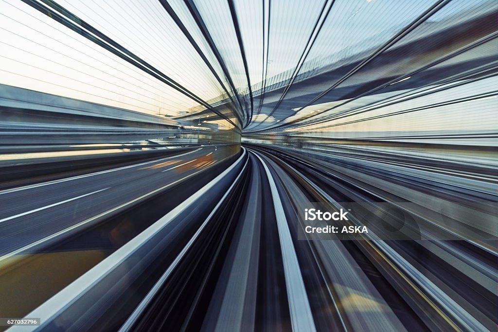 Blurred motion on the Subway in Tokyo Yurikamome line in Tokyo, Japan Railroad Track Stock Photo
