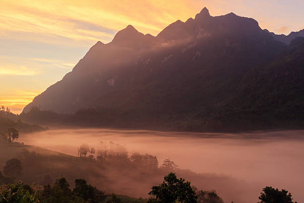 istock High mountain and fog in the morning. 627034474