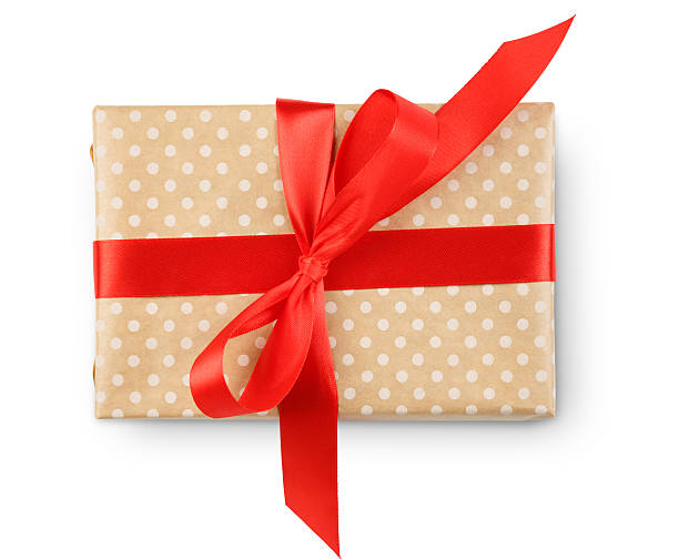 istock Christmas holiday gift box in spotted paper isolated on white 627037300