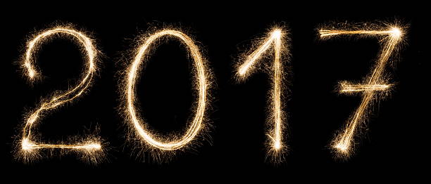 istock New year font sparkler numbers on black background 627037886