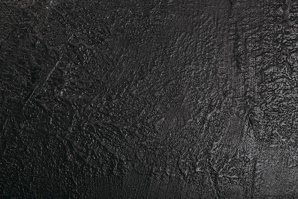 istock Dark grunge textured wall closeup 627038406