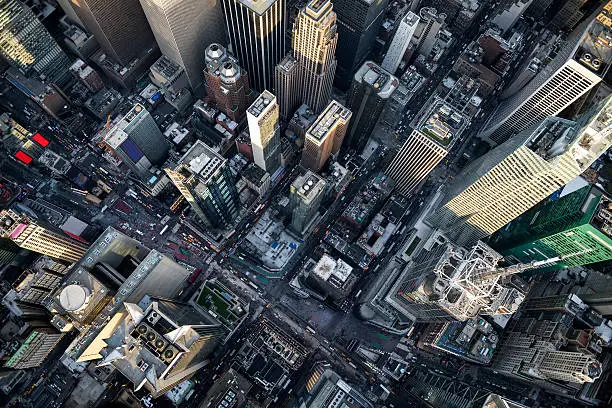 Helicopter point of view of Times Square in New York with many details visible in the image.