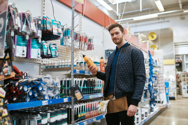 istock Young handyman shopping in a hardware store 627040414