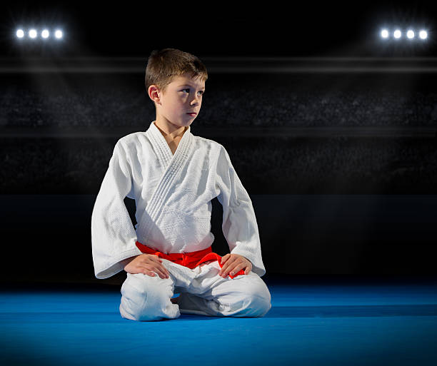 istock Little boy martial arts fighter 627040854
